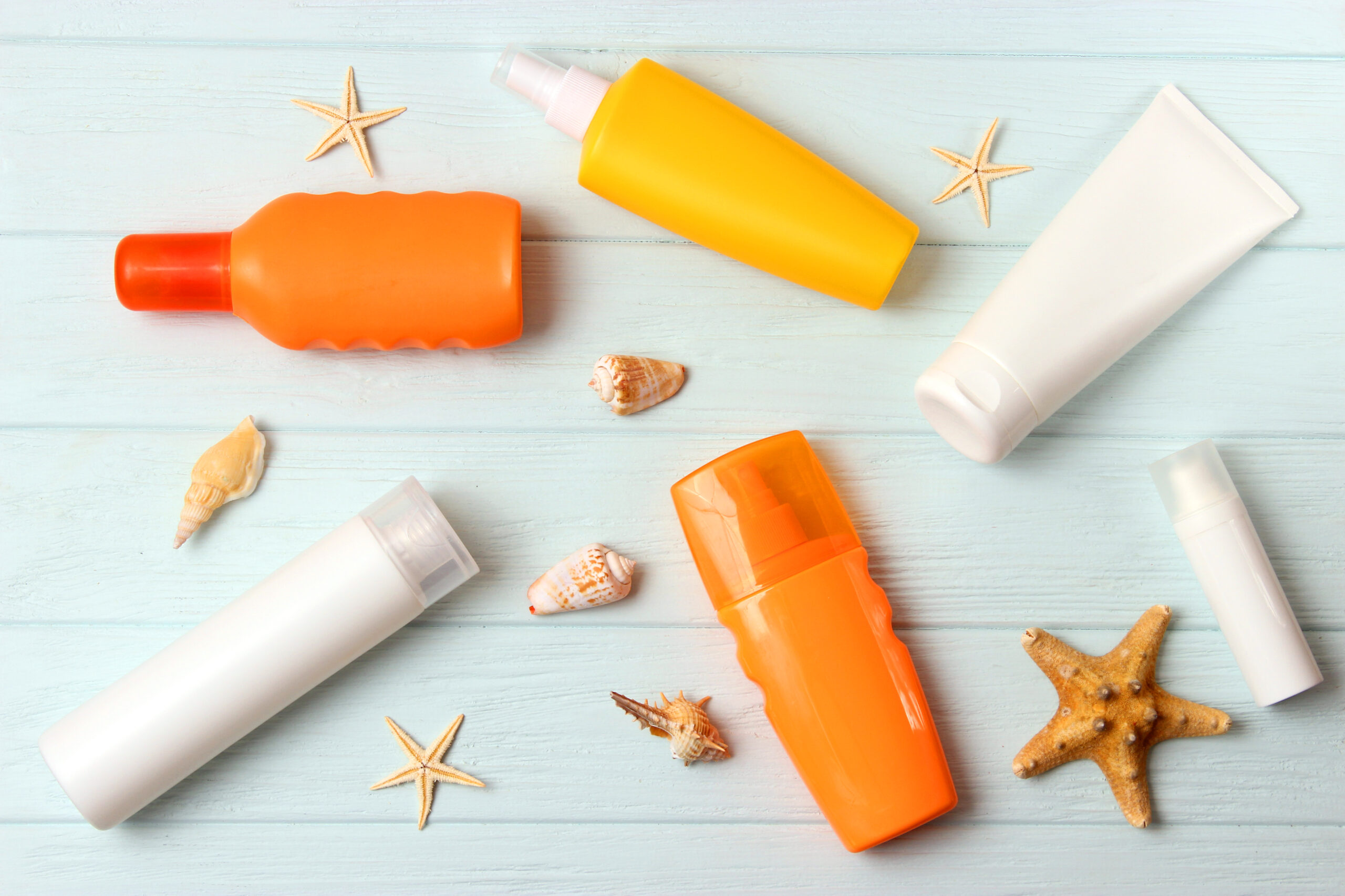 sunscreens on a colored background. Protection of the skin from ultraviolet rays. High quality photo